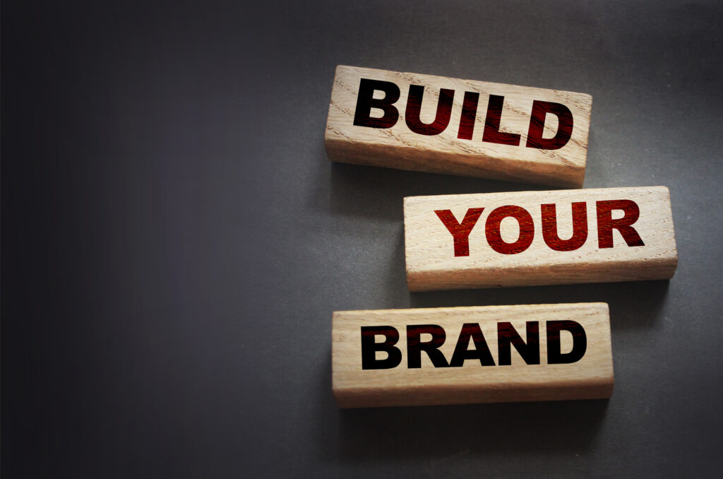 Wooden blocks spelling "Build Your Brand"